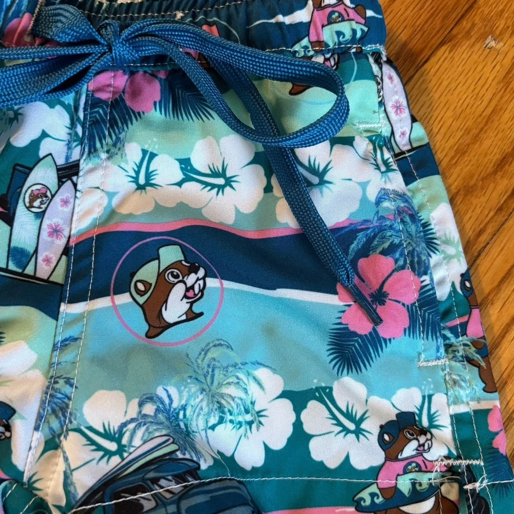 Buc-ee's Toddler 6-9 M Swim Trunks Hawaiian Palm Trees Surfing Floral Teal Green